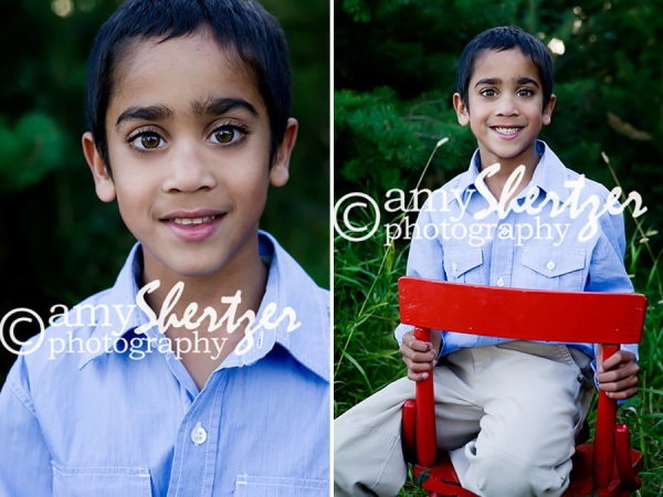 Bozeman boy sits in a red chair for a portrait